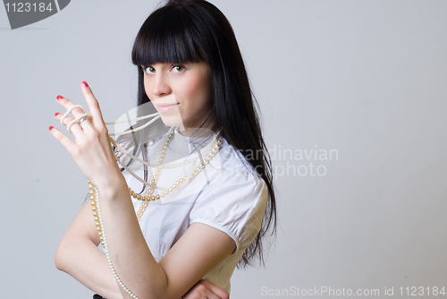 Image of Woman with beads