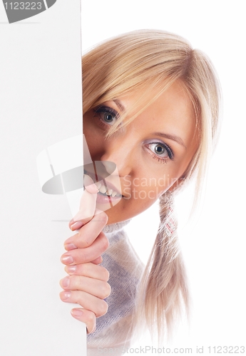 Image of Woman beside whiteboard