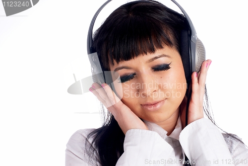 Image of Woman listening music