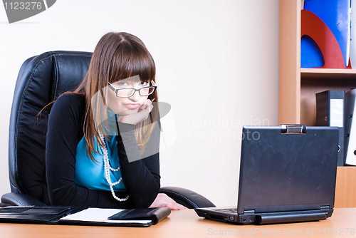 Image of Business woman with laptop