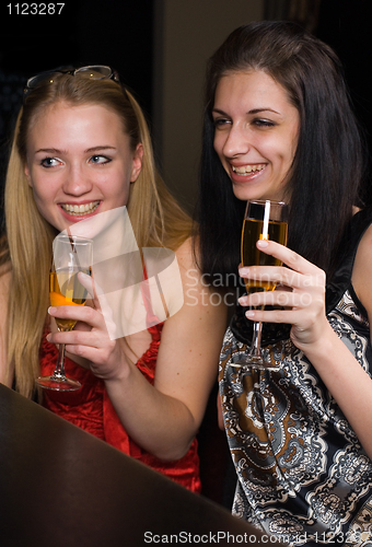 Image of Young women in a bar