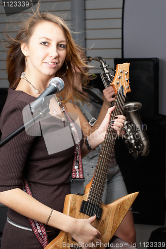 Image of Woman with guitar