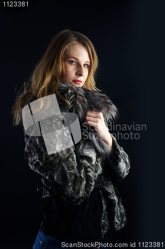 Image of Attractive woman in fur coat