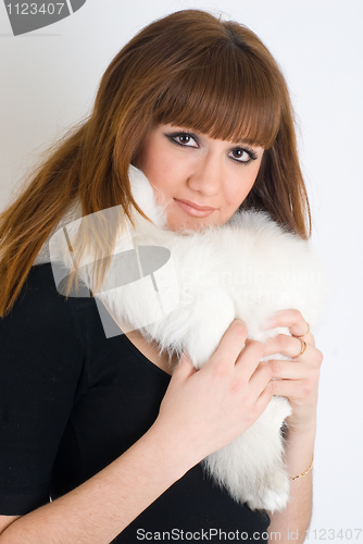 Image of Girl wearing white fur