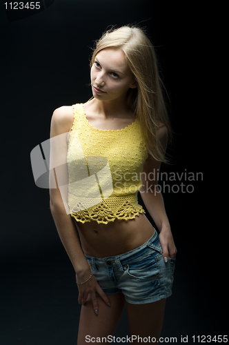 Image of Beautiful girl at black background