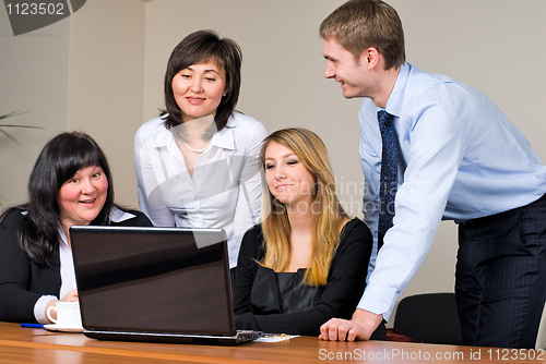 Image of Businessgroup with laptop