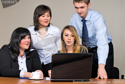 Image of Businessgroup with laptop