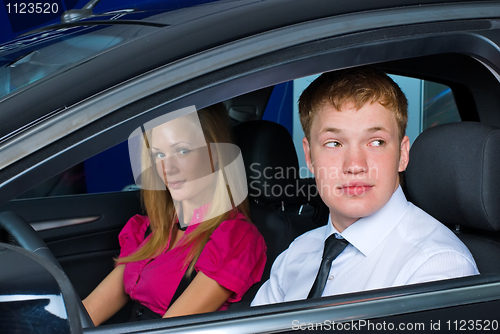 Image of Young couple in car