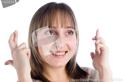 Image of Girl with crossed fingers