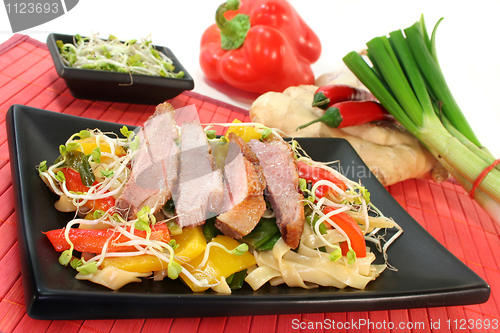 Image of Duck breast with fried noodles