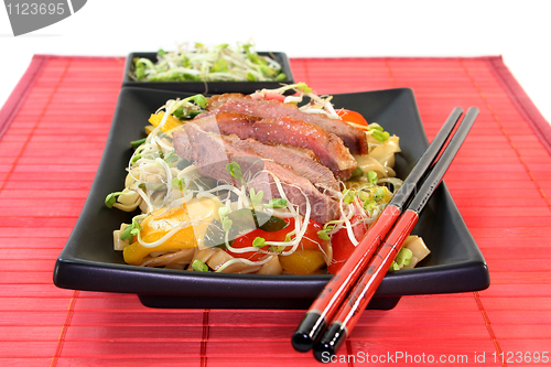 Image of Duck breast with fried noodles