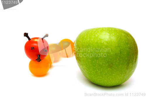 Image of tomato caterpillar with a green apple