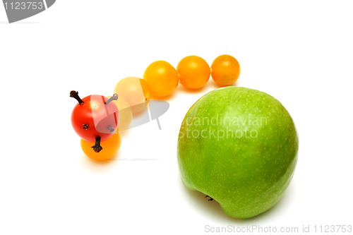 Image of tomato caterpillar with a green apple