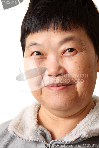 Image of Studio Portrait Of Smiling Senior Woman 