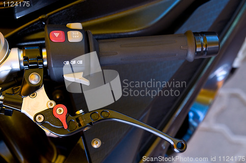 Image of Handlebar and brake lever of a large motorbike