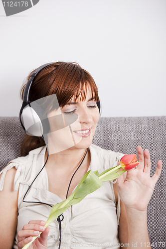 Image of Girl listen music