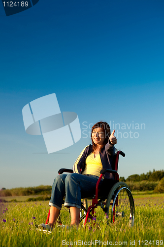 Image of Handicapped woman on wheelchair