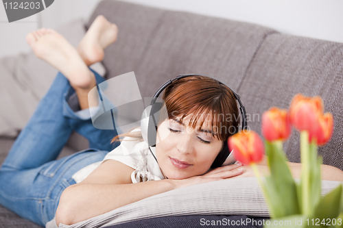 Image of Listening music at home