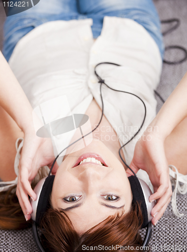 Image of Girl listen music