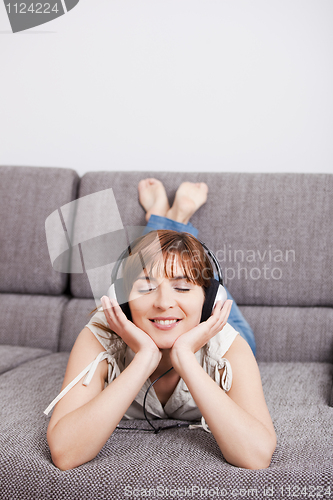 Image of Listening music at home