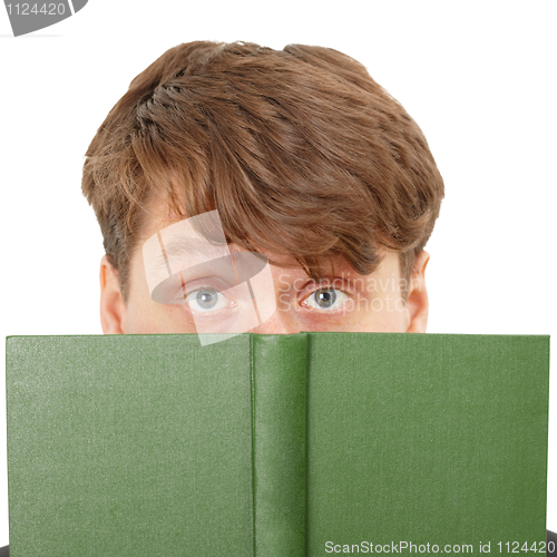 Image of Young man hid his face behind a green book