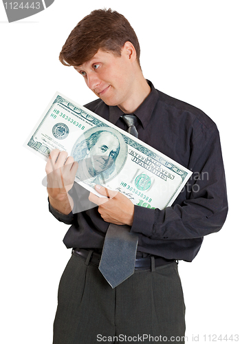 Image of Businessman is nursed with money on white