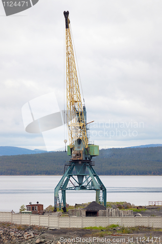 Image of Big port crane on beach
