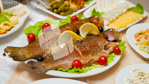 Image of Delicious fried fish on table