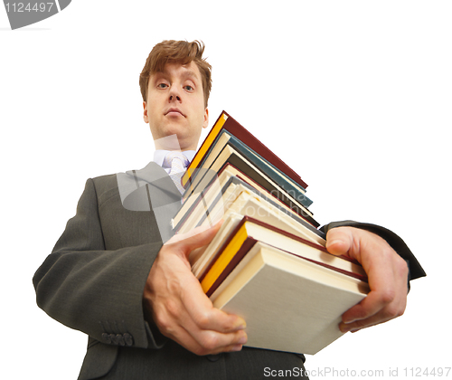 Image of Waggish man holding pile of textbooks