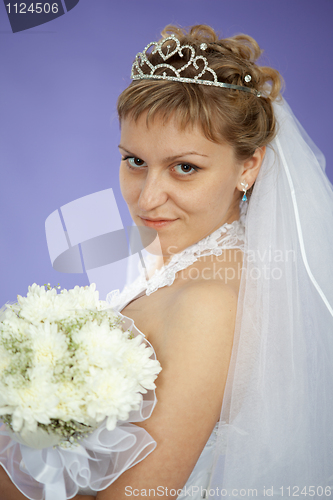Image of Portrait of beautiful young woman - bride on violet