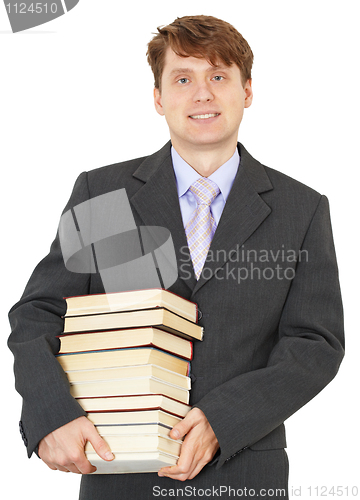 Image of Portrait of man with big pile of books