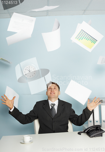 Image of Bureaucrat -  businessman juggling documents