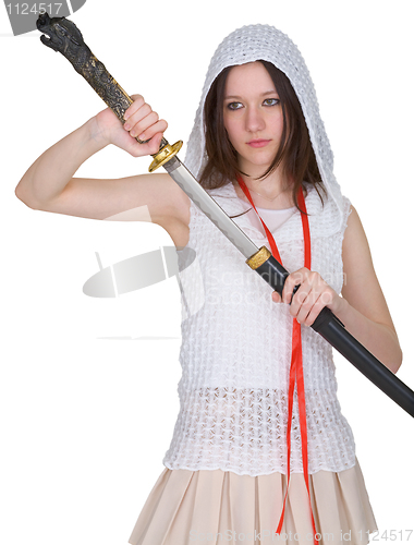 Image of Girl teen slowly takes out katana from sheath