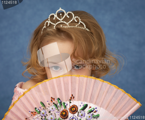 Image of Portrait of young girl with Oriental fan