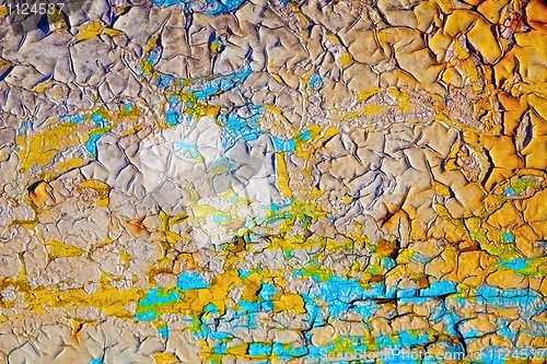 Image of Cracked oil paint on wall surface