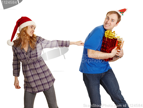 Image of Man hides all Christmas gifts from woman