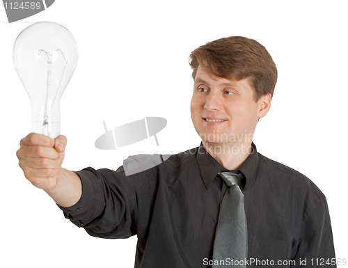 Image of Satisfied man holding a light bulb