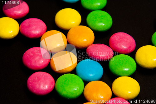 Image of Colorful candy on black background