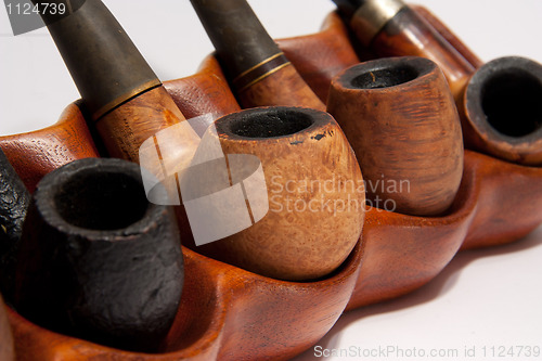 Image of Old pipes on stand