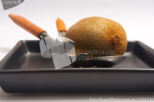 Image of Kiwi on black plate