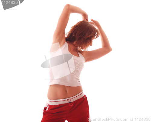 Image of attractive teenage dancing over white background