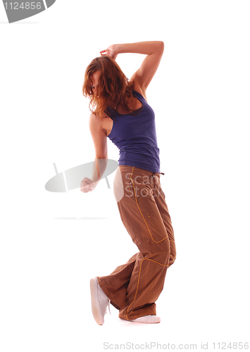 Image of attractive teenage dancing over white background