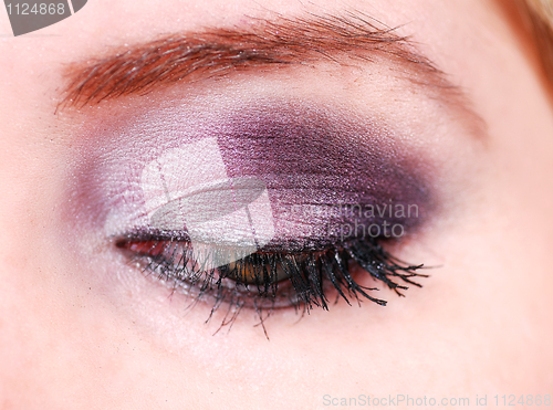 Image of female eye with make up