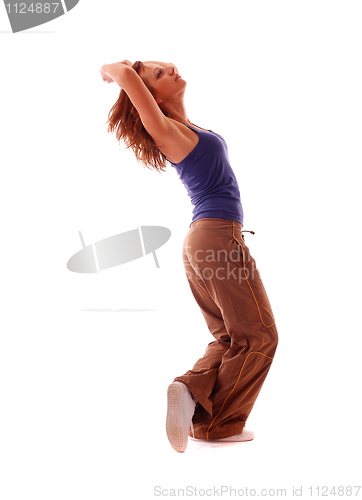 Image of attractive teenage dancing over white background
