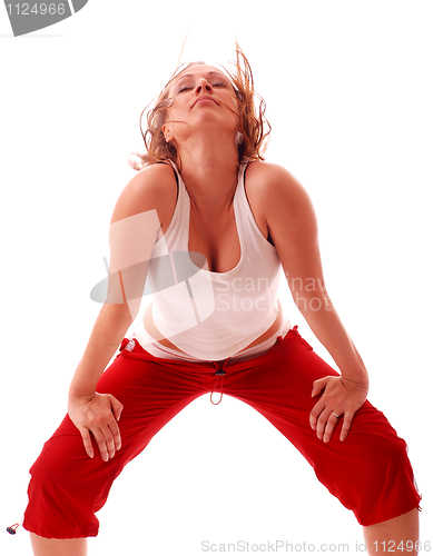 Image of attractive teenage dancing over white background