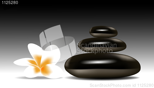 Image of spa stones with flower