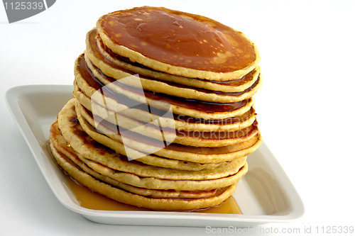 Image of Stack of pancakes with syrup