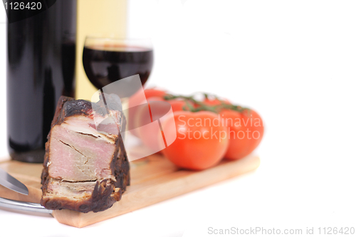 Image of wine and smoked meat 