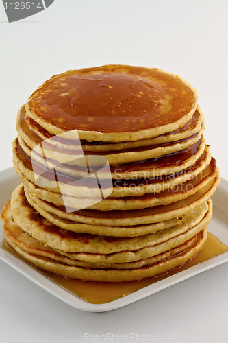 Image of Stack of pancakes with syrup