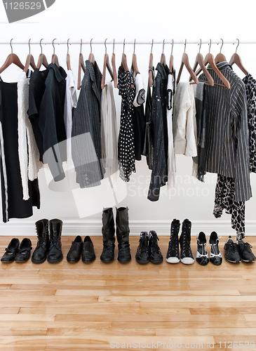 Image of Black and white female clothes and shoes